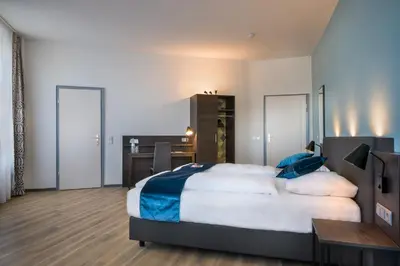 Ein Bett oder Betten in einem Zimmer der Unterkunft Hotel Ruf
