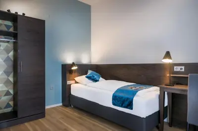 Ein Bett oder Betten in einem Zimmer der Unterkunft Hotel Ruf