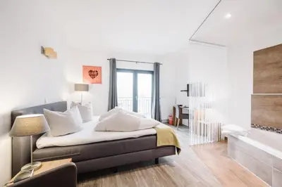 Ein Bett oder Betten in einem Zimmer der Unterkunft Jordan's Untermühle