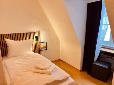 Ein Bett oder Betten in einem Zimmer der Unterkunft Hotel Zum Pfalzgrafen