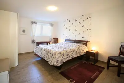 Ein Bett oder Betten in einem Zimmer der Unterkunft Hainhof Gästewohnungen
