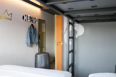 Ein Bett oder Betten in einem Zimmer der Unterkunft Felix Hotel Darmstadt