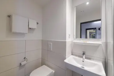 Ein Badezimmer in der Unterkunft Felix Hotel Darmstadt