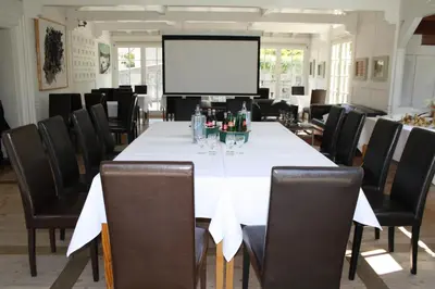 Der Geschäftsbereich oder Konferenzraum in der Unterkunft Hotel Hahn Gondelsheim