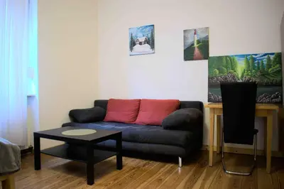 Ein Sitzbereich in der Unterkunft Goldstadt Ferienwohnung