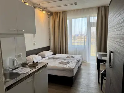 Ein Bett oder Betten in einem Zimmer der Unterkunft Gästehaus Haßloch/Pfalz