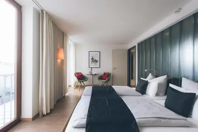 Ein Bett oder Betten in einem Zimmer der Unterkunft Das Wildeck Hotel & Restaurant