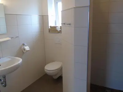Ein Badezimmer in der Unterkunft Wein- Appartements Borth