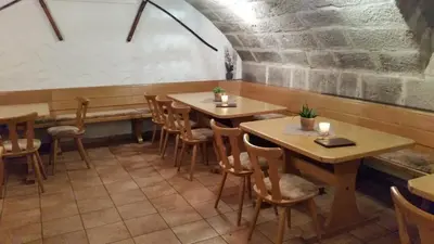 Ein Restaurant oder anderes Speiselokal in der Unterkunft Wein- Appartements Borth