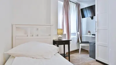 Ein Bett oder Betten in einem Zimmer der Unterkunft Hotel Frankenthaler Hof