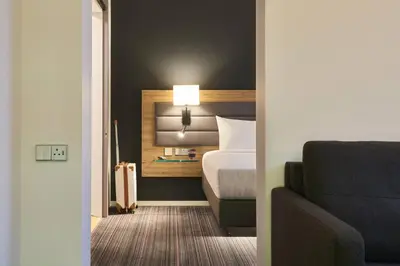 Ein Bett oder Betten in einem Zimmer der Unterkunft Moxy Ludwigshafen
