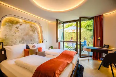 Ein Bett oder Betten in einem Zimmer der Unterkunft Hotel Neues Tor