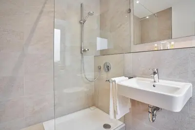 Ein Badezimmer in der Unterkunft Hotel Goldener Engel