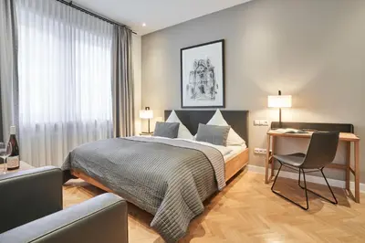 Ein Bett oder Betten in einem Zimmer der Unterkunft Hotel Goldener Engel