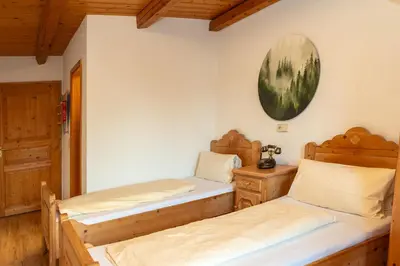 Ein Bett oder Betten in einem Zimmer der Unterkunft Grüner Baum