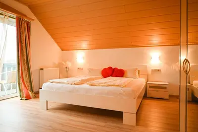 Ein Bett oder Betten in einem Zimmer der Unterkunft Grüner Baum