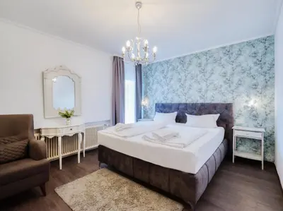 Ein Bett oder Betten in einem Zimmer der Unterkunft Hotel-Restaurant Central am Königshof