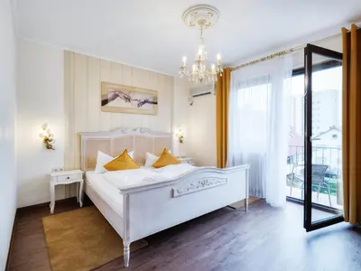 Ein Bett oder Betten in einem Zimmer der Unterkunft Hotel-Restaurant Central am Königshof