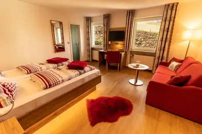 Ein Bett oder Betten in einem Zimmer der Unterkunft Landhotel Kühler Grund