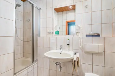 Ein Badezimmer in der Unterkunft Hotel Straubs Schöne Aussicht