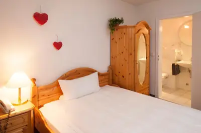 Ein Bett oder Betten in einem Zimmer der Unterkunft Hotel Wappenstube