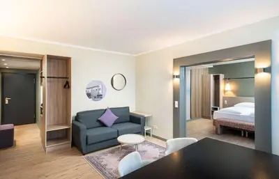 Ein Bett oder Betten in einem Zimmer der Unterkunft elaya hotel stuttgart ludwigsburg, Trademark by Wyndham