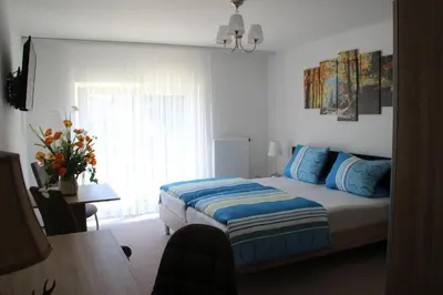 Ein Bett oder Betten in einem Zimmer der Unterkunft Wirtshaus zum Wilddieb