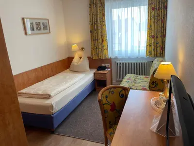 Ein Bett oder Betten in einem Zimmer der Unterkunft Hotel Ebnet