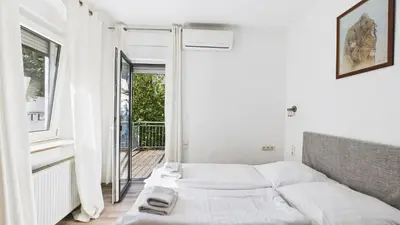 Ein Bett oder Betten in einem Zimmer der Unterkunft City Hotel