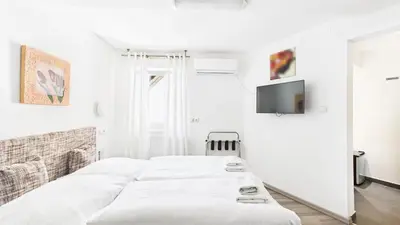 Ein Bett oder Betten in einem Zimmer der Unterkunft City Hotel