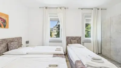 Ein Bett oder Betten in einem Zimmer der Unterkunft City Hotel