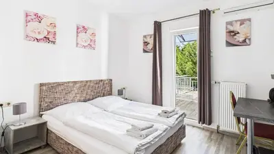 Ein Bett oder Betten in einem Zimmer der Unterkunft City Hotel