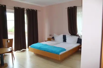 Ein Bett oder Betten in einem Zimmer der Unterkunft Heppenheimer Hof Hotel