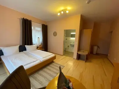 Ein Bett oder Betten in einem Zimmer der Unterkunft Heppenheimer Hof Hotel