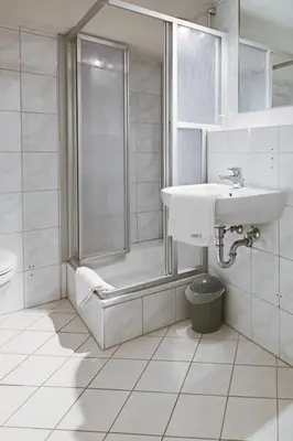 Ein Badezimmer in der Unterkunft Hotel Haus Landgraf