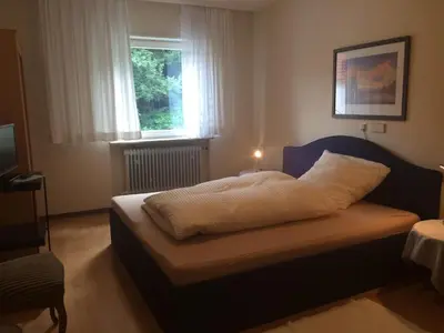Ein Bett oder Betten in einem Zimmer der Unterkunft ICC Pfälzer Hof - Hotel & Seminarhaus