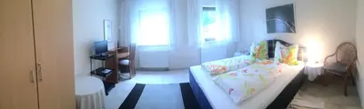 Ein Bett oder Betten in einem Zimmer der Unterkunft ICC Pfälzer Hof - Hotel & Seminarhaus