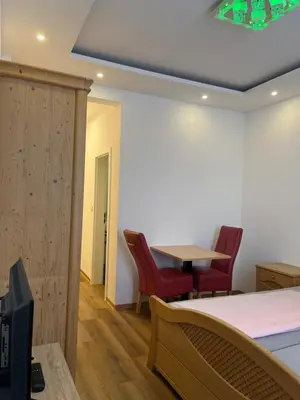 Ein Bett oder Betten in einem Zimmer der Unterkunft Trang Hotel Rastatt