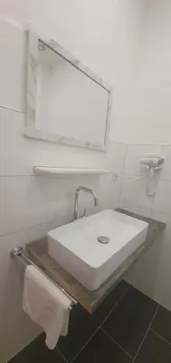 Ein Badezimmer in der Unterkunft Trang Hotel Rastatt