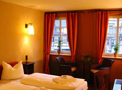 Ein Bett oder Betten in einem Zimmer der Unterkunft Hotel Villa Boddin