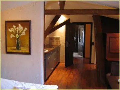 Ein Bett oder Betten in einem Zimmer der Unterkunft Hotel Villa Boddin
