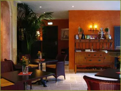 Ein Sitzbereich in der Unterkunft Hotel Villa Boddin