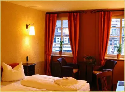 Ein Bett oder Betten in einem Zimmer der Unterkunft Hotel Villa Boddin