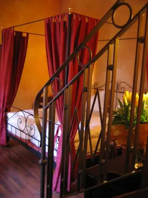 Ein Bett oder Betten in einem Zimmer der Unterkunft Hotel Villa Boddin
