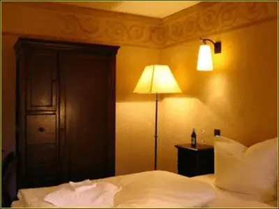 Ein Bett oder Betten in einem Zimmer der Unterkunft Hotel Villa Boddin