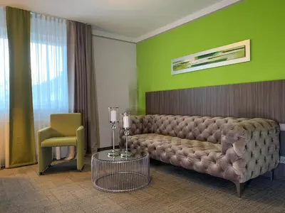 Ein Sitzbereich in der Unterkunft Hotel Ambiente Walldorf
