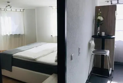 Ein Bett oder Betten in einem Zimmer der Unterkunft Hotel Langhans