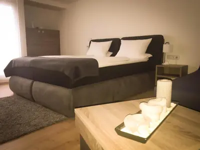Ein Bett oder Betten in einem Zimmer der Unterkunft Hotel Langhans