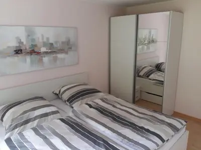 Ein Bett oder Betten in einem Zimmer der Unterkunft Ferienwohnung Peter Hofling