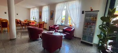 Ein Sitzbereich in der Unterkunft Hotel Deutscher Hof